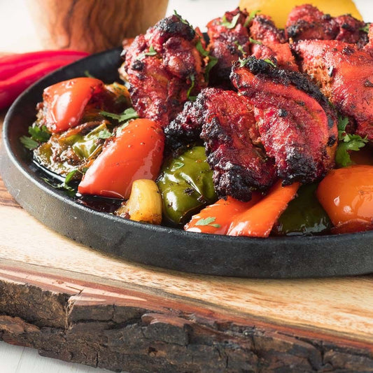 POLLO TIKKA SIZZLER
