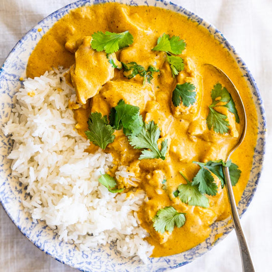 POLLO KORMA SIN ESPECIAS CON PAPAS FRITAS O ARROZ